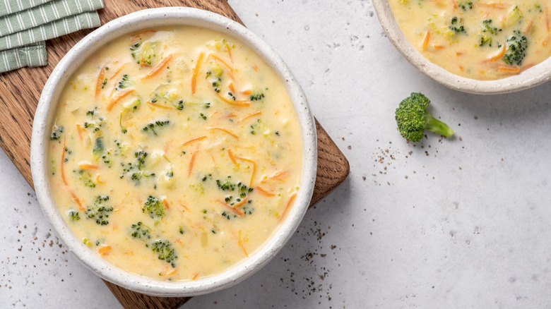 Top view of bowl of broccoli cheddar soup