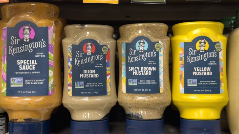 Bottles of Sir Kensington's mustard on the shelf.