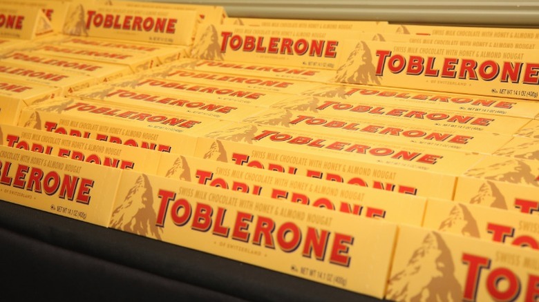 Toblerone chocolate bars sorted on a table for display.