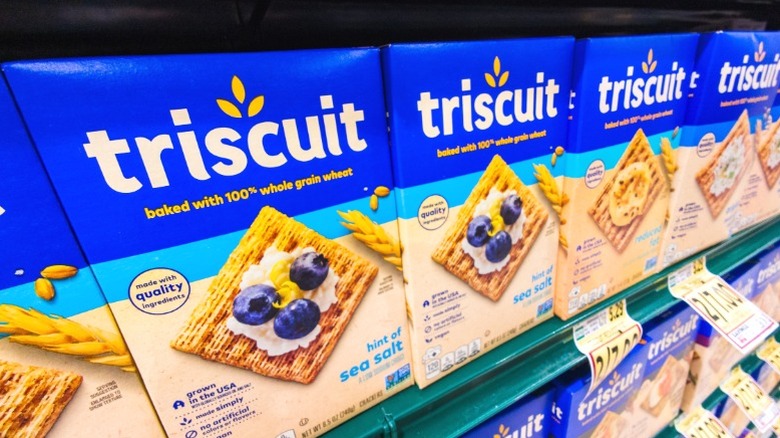 Boxes of Triscuits on a supermarket shelf.