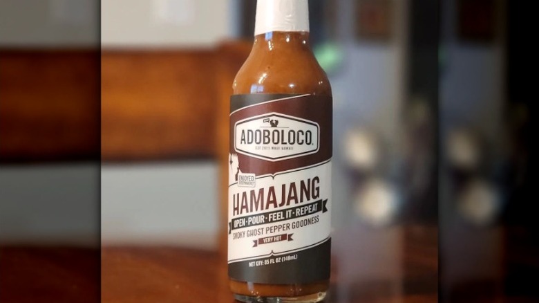 A bottle of Adoboloco Hamajang Hot Sauce.