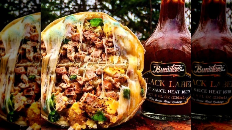 A bottle of Bunsters Black Label Hot Sauce.