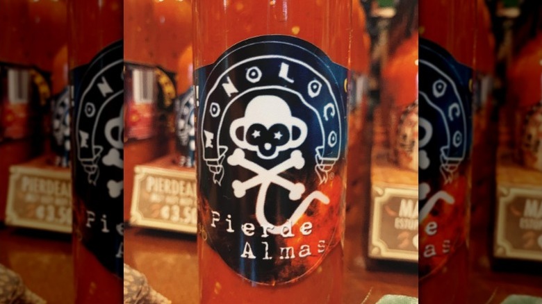 The label on a bottle of Chile Monoloco Pierdealmas Hot Sauce.