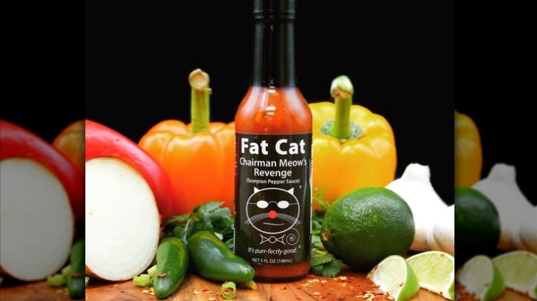 A bottle of Fat Cat Chairman Meow's Revenge Hot Sauce.