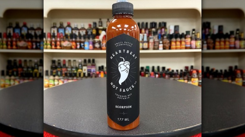 A bottle of Heartbeat Hot Sauce Scorpion Hot Sauce.