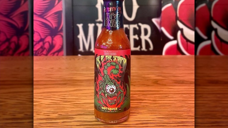 A bottle of Hot Ones Eye of the Scorpion Hot Sauce.