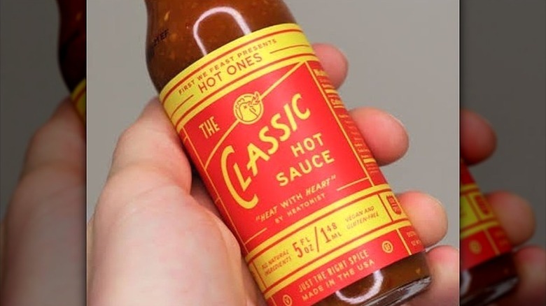A bottle of Hot Ones The Classic Hot Sauce.