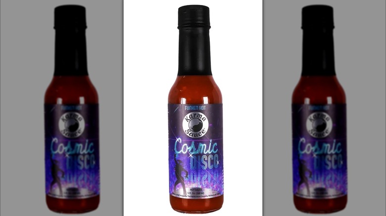 A bottle of Karma Sauce Cosmic Disco Hot Sauce.