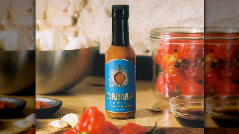 A bottle of Onima II Mig+ Hot Sauce.