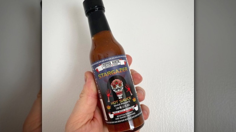 A bottle of Pepper North Stargazer Hot Sauce.
