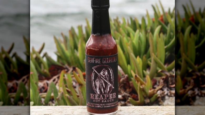 A bottle of Seafire Gourmet Reaper Hot Sauce.
