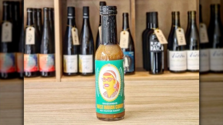 A bottle of Shaquanda's West Indian Curry Hot Sauce.