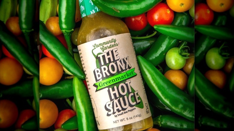 A bottle of Small Axe Peppers The Bronx Greenmarket Hot Sauce.