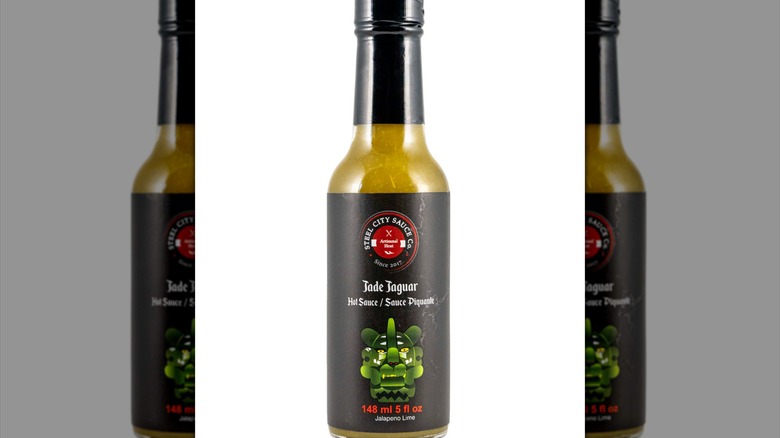 A bottle of Steel City Sauce Co Jade Jaguar Hot Sauce.