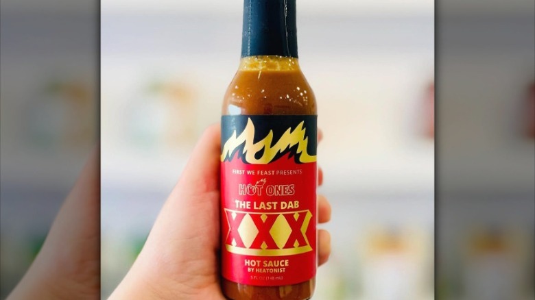 A bottle of Hot Ones The Last Dab.