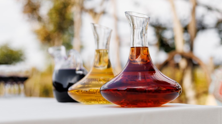 red and white wines in decanters