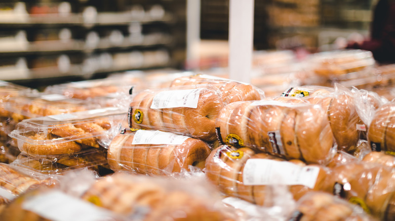 Bags of bagels in the Costco bakery section.