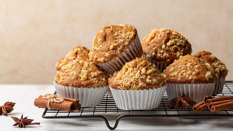 Homemade cinnamon streusel muffins on a wire rack