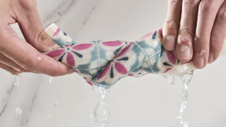 swedish dishcloth being wrung out