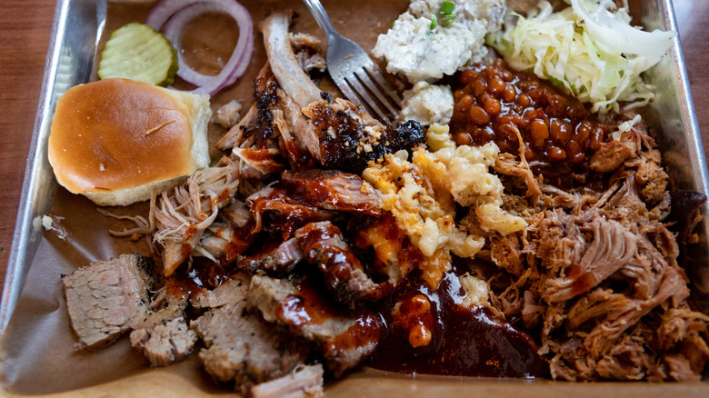 platter with assorted barbecued meats and other accoutrements