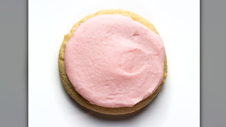A Pink Sugar Cookie from Crumbl on a white background.