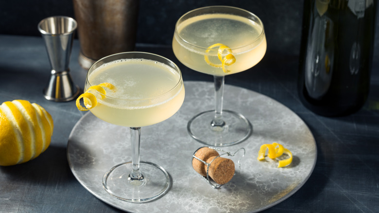 Two French 75 cocktails in coupe glasses