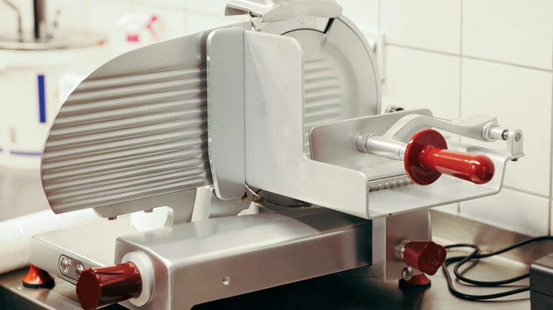 Deli slicer in restaurant kitchen