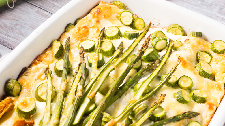 Asparagus lasagna in a white baking dish
