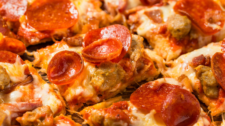 Square cut pizza with pepperoni and sausage