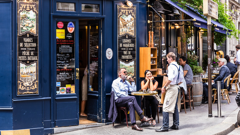 People in a cafe in Paris, France