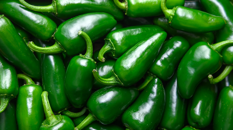 Heap of green jalapeno peppers