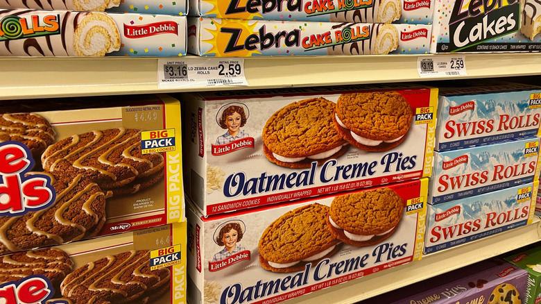 Variety of Little Debbie snack cakes on store shelves