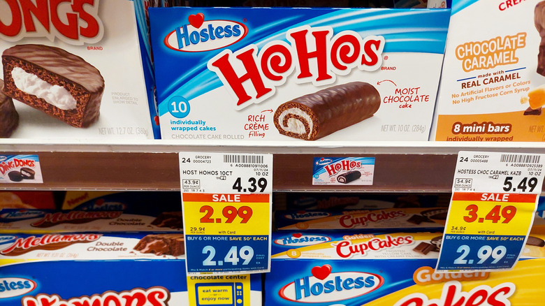 An array of Hostess snack cake products on supermarket shelves