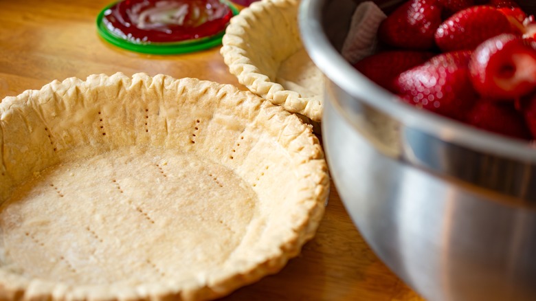 A docked, blind-baked pie crust.