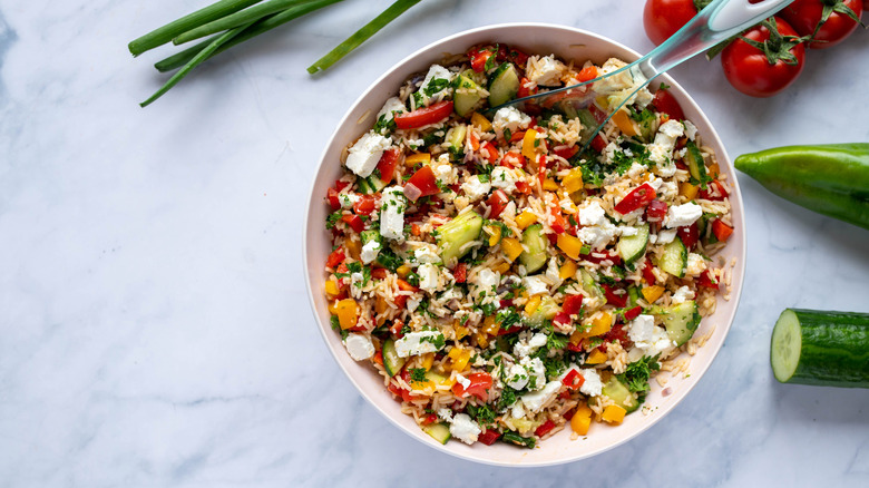 A bowl of rice salad.