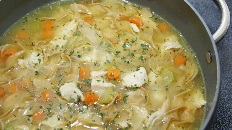 Closeup of chicken noodle soup in pot