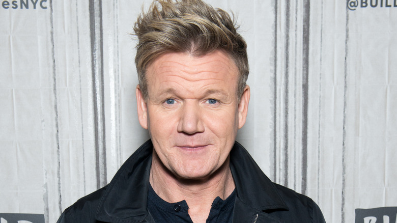 Gordon Ramsey candid headshot in front of gray background