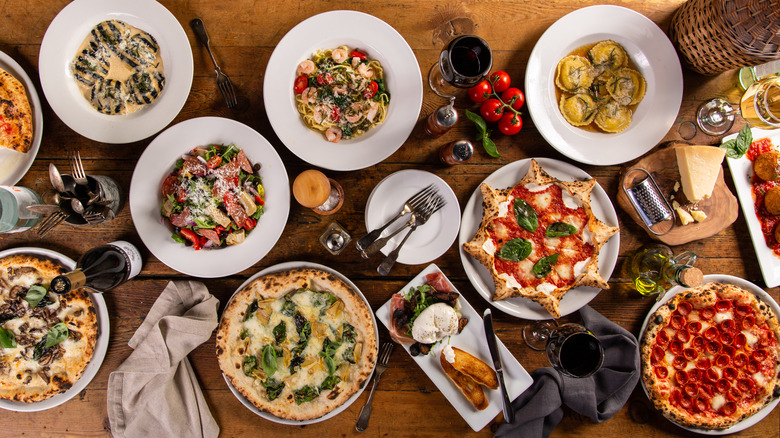 A table laid with various Italian dishes