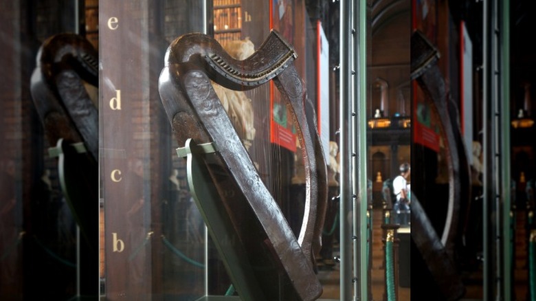 The Trinity College Harp on display in the Long Room.