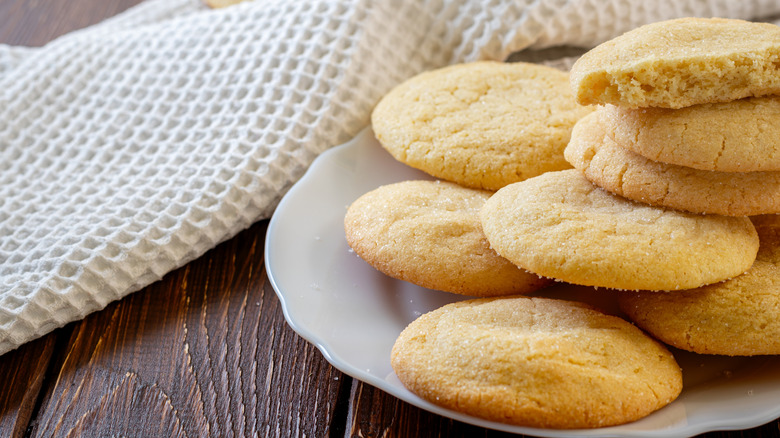 Sugar cookies stacked on a plate