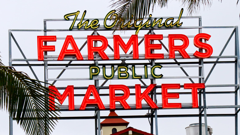 Red and yellow sign at Original Farmers Market