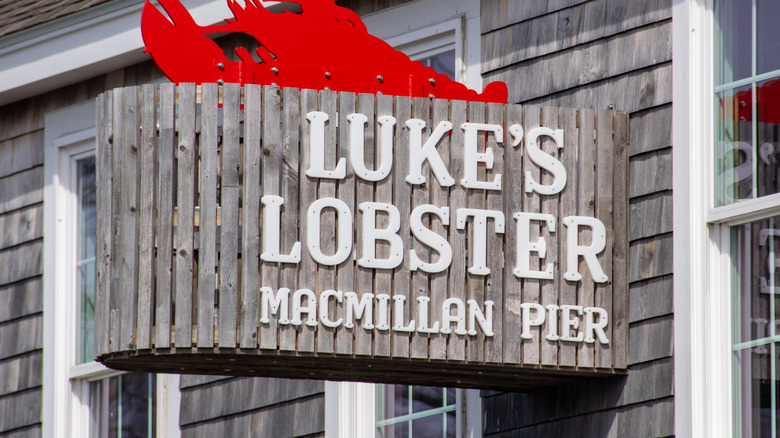 Hanging outdoor sign of Luke's Lobster