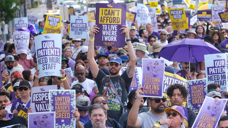 Healthcare workers marching in 2023 Labor Day protest