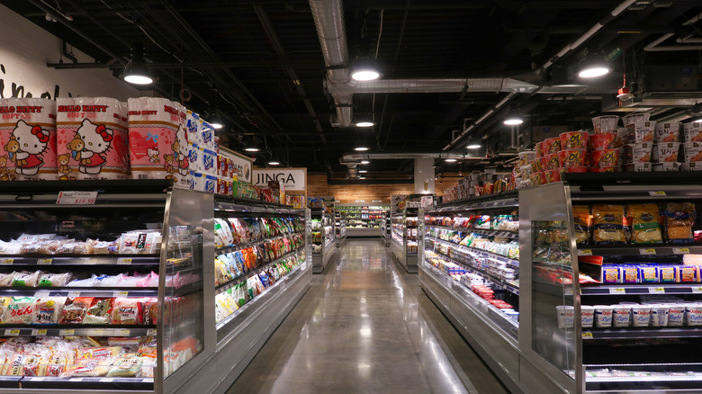 Stocked aisles inside an H Mart store