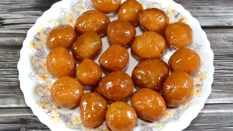Plate covered with fried zalabia