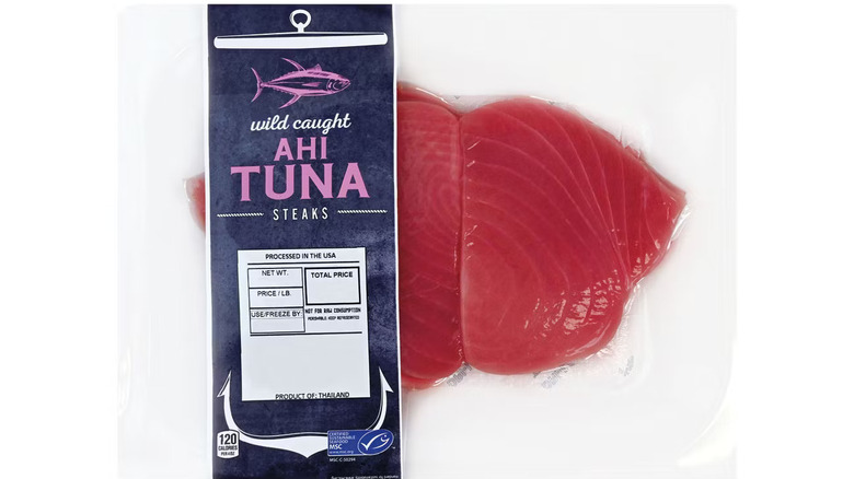 Wild Caught Ahi Tuna Steaks by Specially Selected against a white background