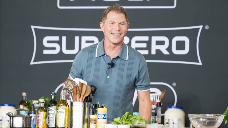 Bobby Flay smiling during cooking demonstration