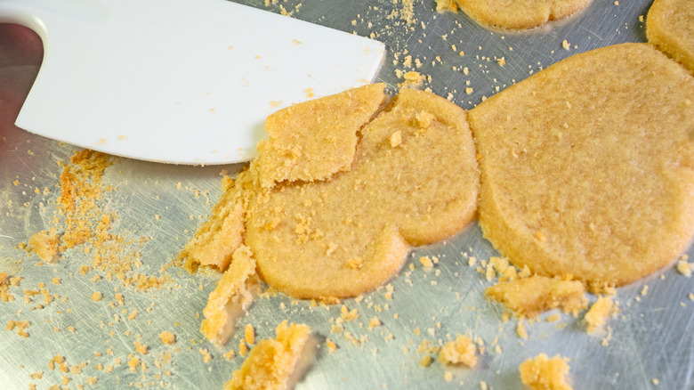 Cookies stuck to a baking sheet
