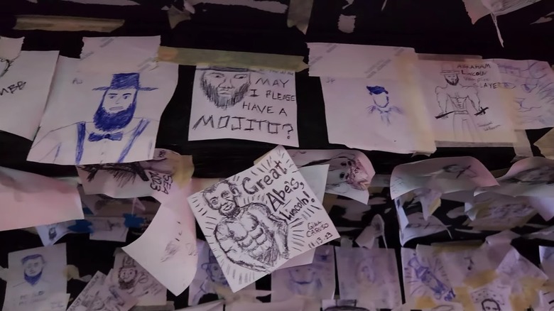 Drawings of Abe Lincoln hanging from the rafters.
