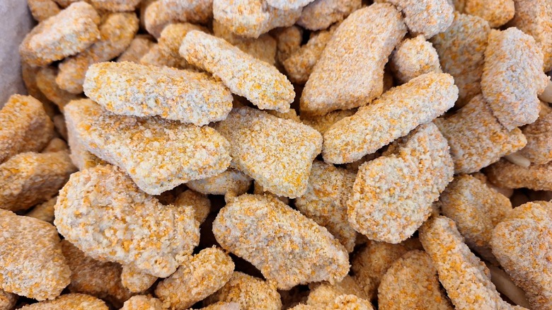 A close-up of frozen chicken nuggets
